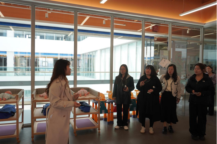 赴郑州西亚斯学院教育学院调研交流